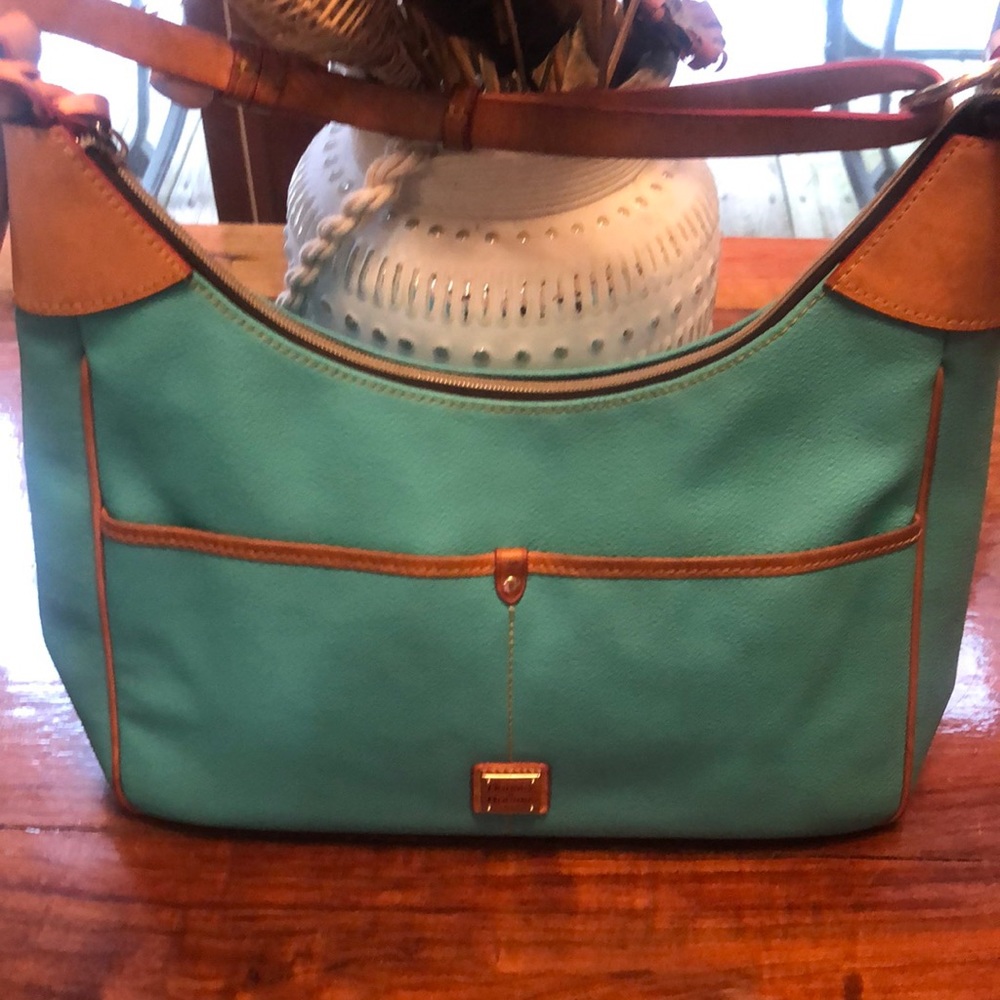 Beautiful Aqua blue purse Dooney and Bourke purse. Excellent condition